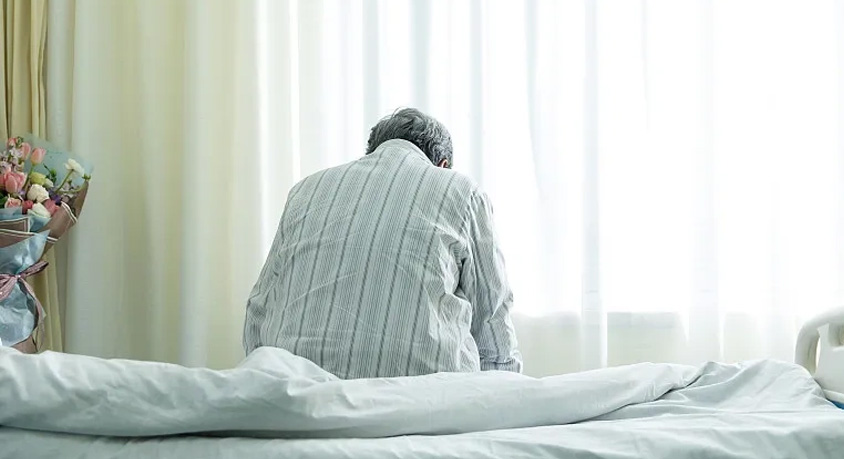 What is the link between social isolation and levels of stress hormones and chronic systemic inflammation?